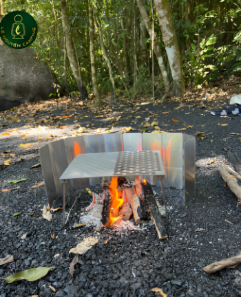 The grill has folding legs for camping and picnic travel 5