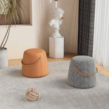Modern Luxurious Leather Stool with Handle - GC25 The  compact round sofa stool is easy to move and can be arranged in many positions in the room