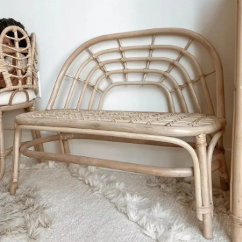 Our Children's Rattan Rainbow Bench, storage cabinets and baskets made from natural, creating a warm and safe space.