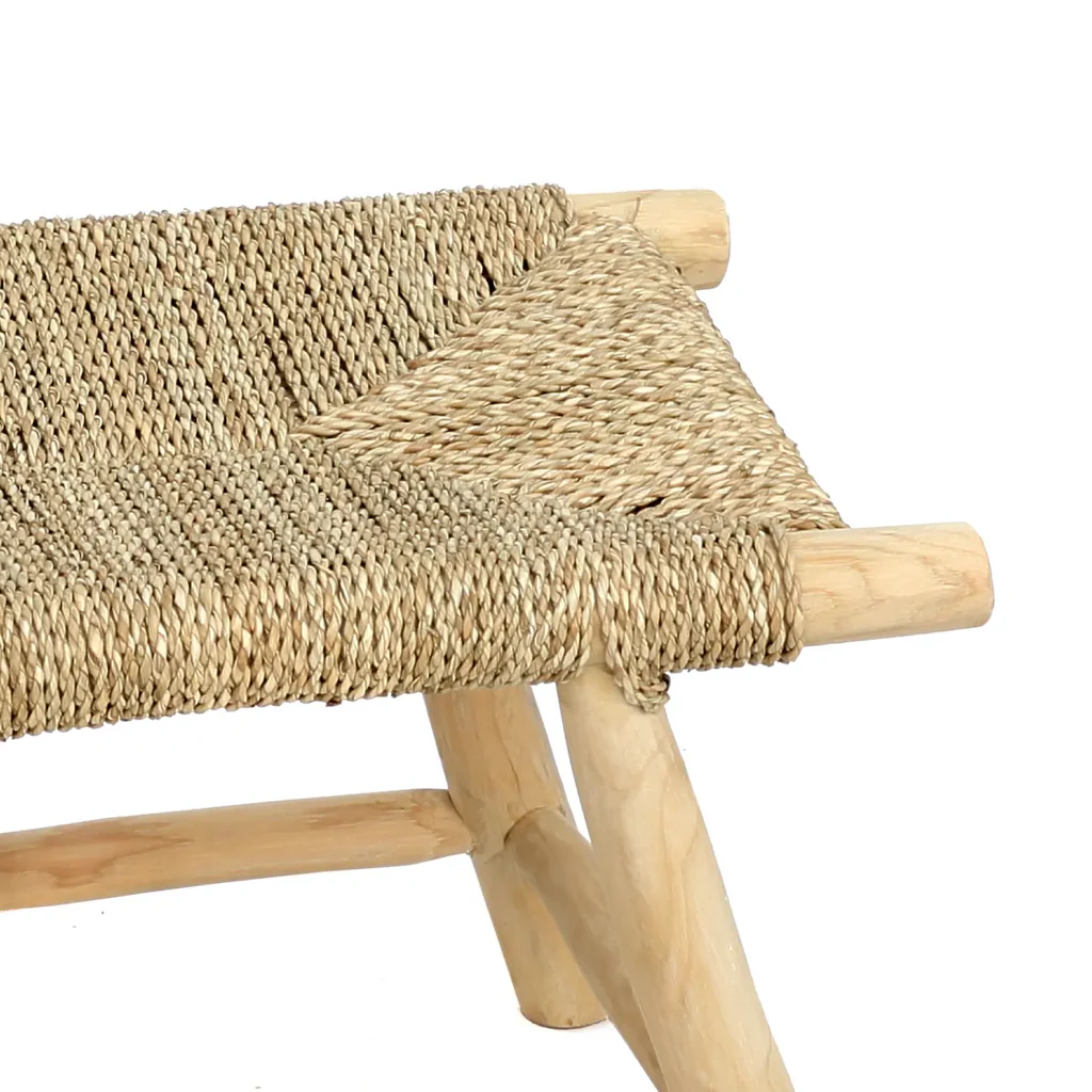 Handcrafted seagrass chairs storage cabinets, and baskets made from natural, creating a warm and safe space. 2