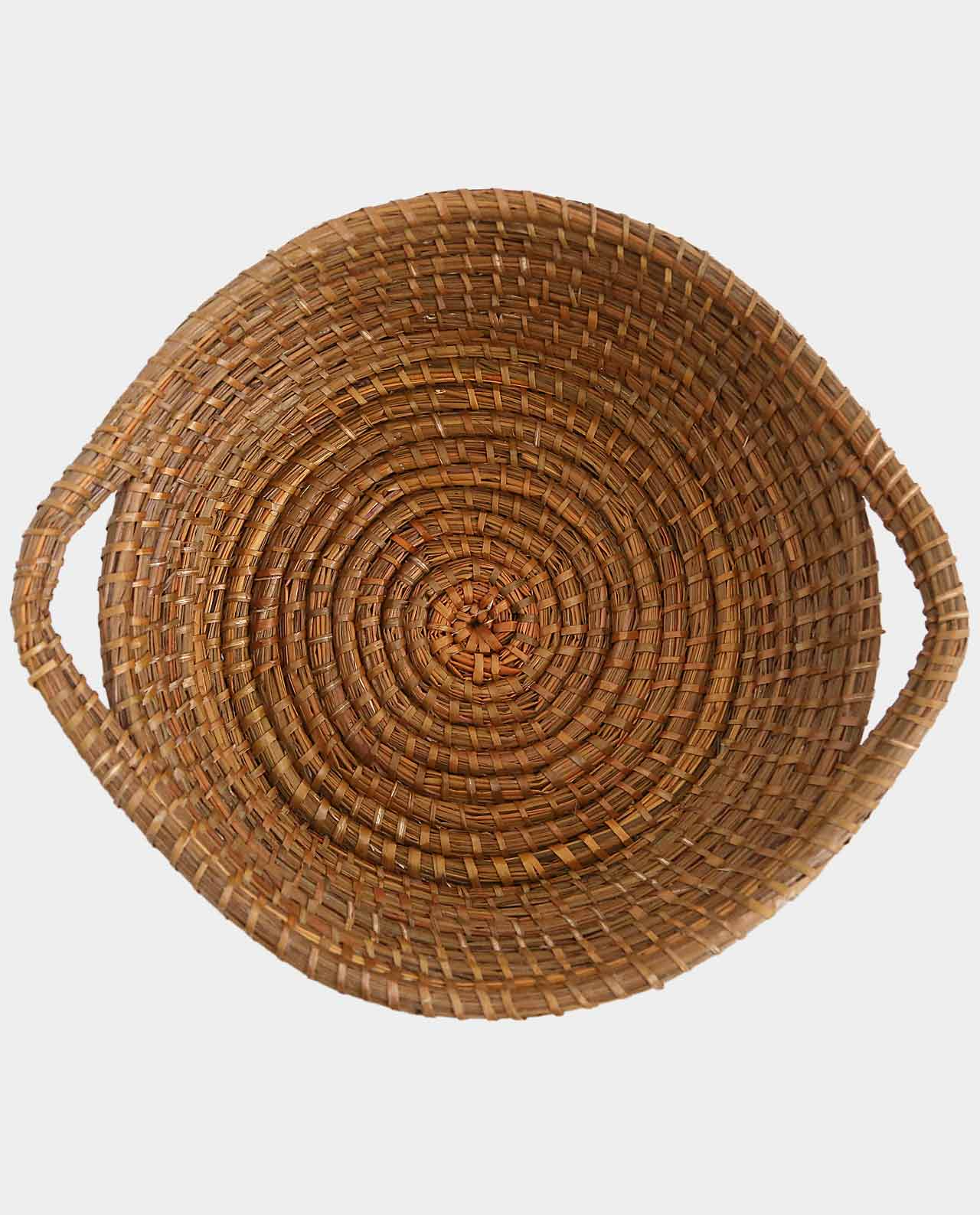 Hand woven basket rattan, bamboo, water hycinth, seagrass round basket tray for holding bread and fruit, objects. Fashionable 3
