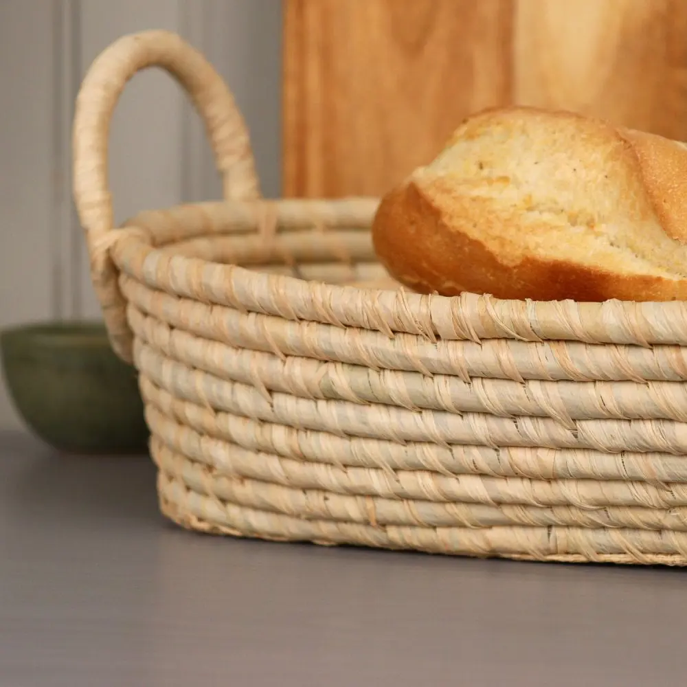 Hand-woven baskets made of rattan, bamboo, water hyacinth, seagrass for bread, fruit, fashion items, table decoration 4