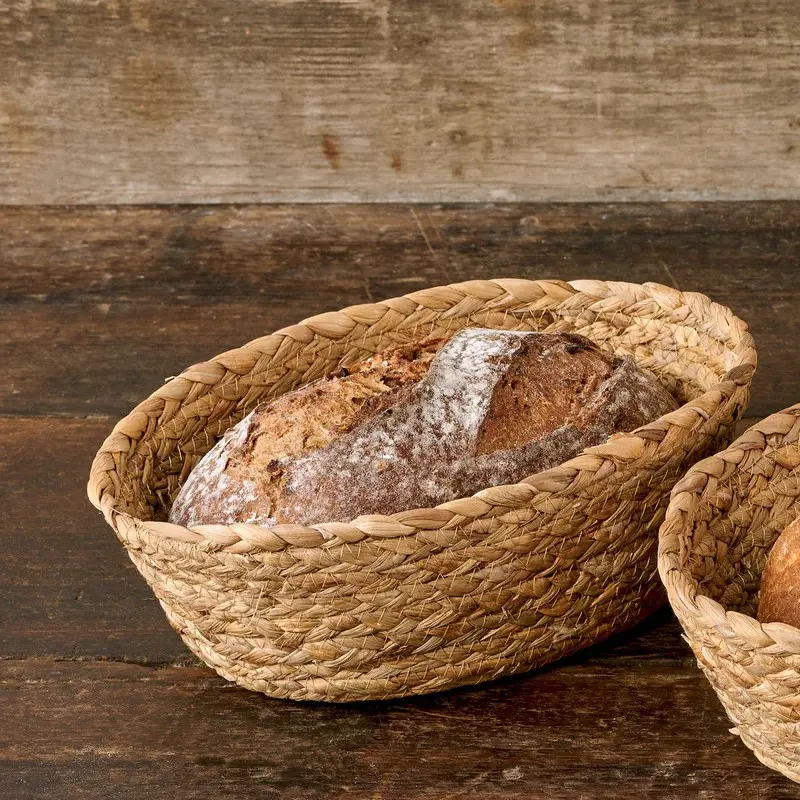 Hand-woven baskets oval made of rattan, bamboo, water hyacinth, and seagrass for bread, fruit, fashion items, table decoration 2