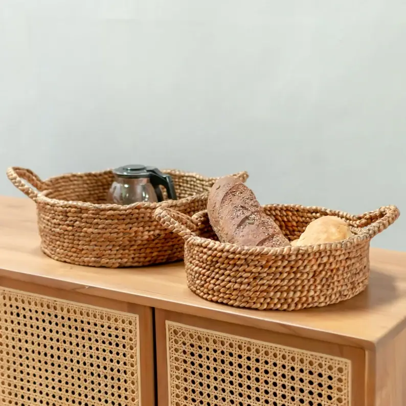 Hand-woven baskets round made of rattan, bamboo, water hyacinth, seagrass for bread, fruit, fashion items, table decoration 1