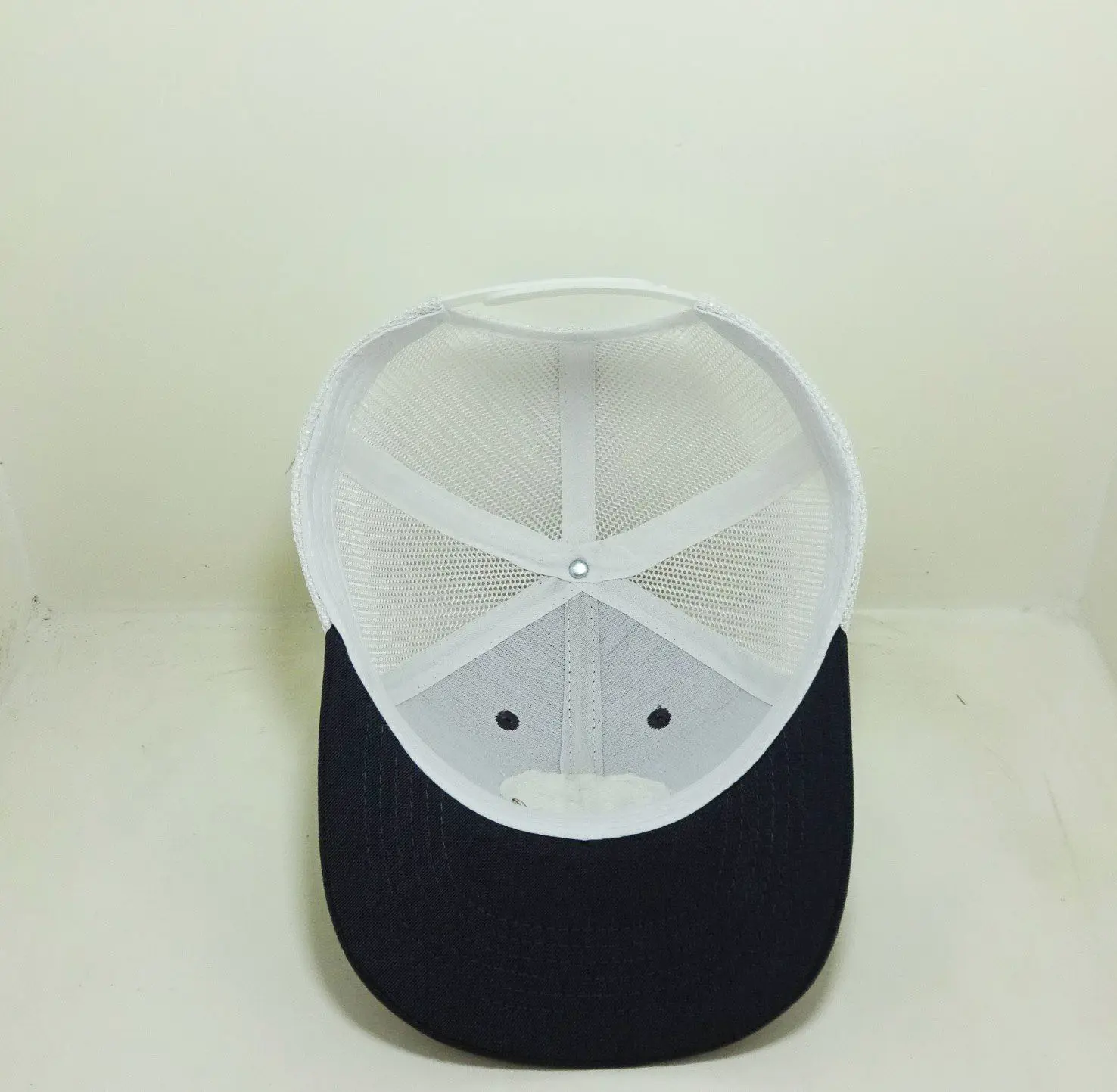 Wholesale Leather Patch Circle and Embossing Logo Trucker Black/ White Caps Men Sport Custom Make Hats in Vietnam 2