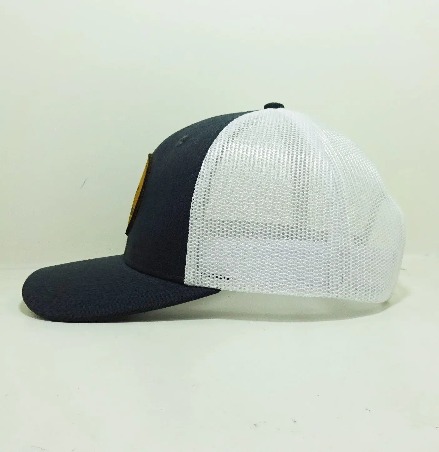 Wholesale Leather Patch Circle and Embossing Logo Trucker Black/ White Caps Men Sport Custom Make Hats in Vietnam 3